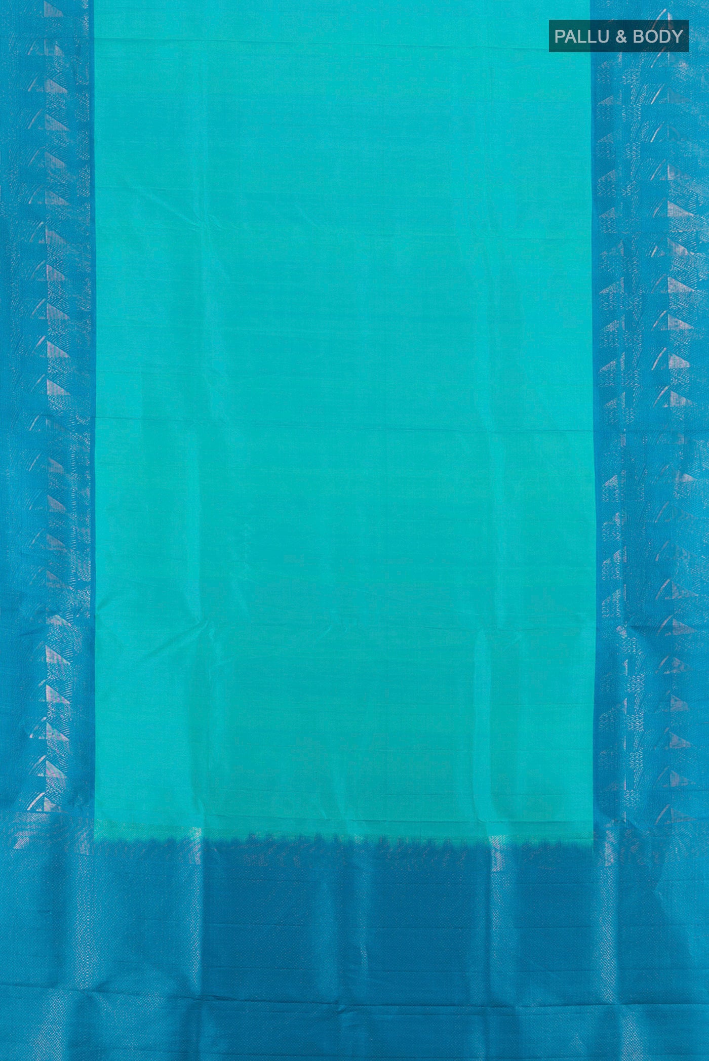 Flat view of Turquoise Soft Silk Saree with Plain Body and Fancy Border. 