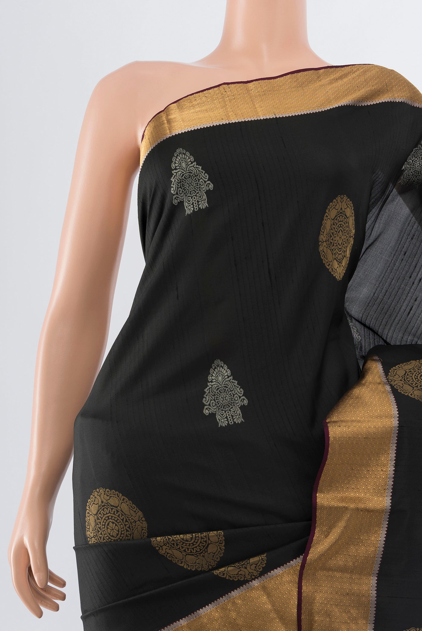 Border image of Pure Silk Pure Zari Black Soft Saree with Zari Butta on the body and Silk Border. 
