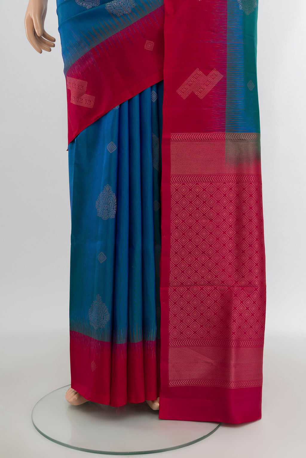 Pleats and pallu of Blue Soft Silk Saree with Zari Butta on the body and Zari Border. 