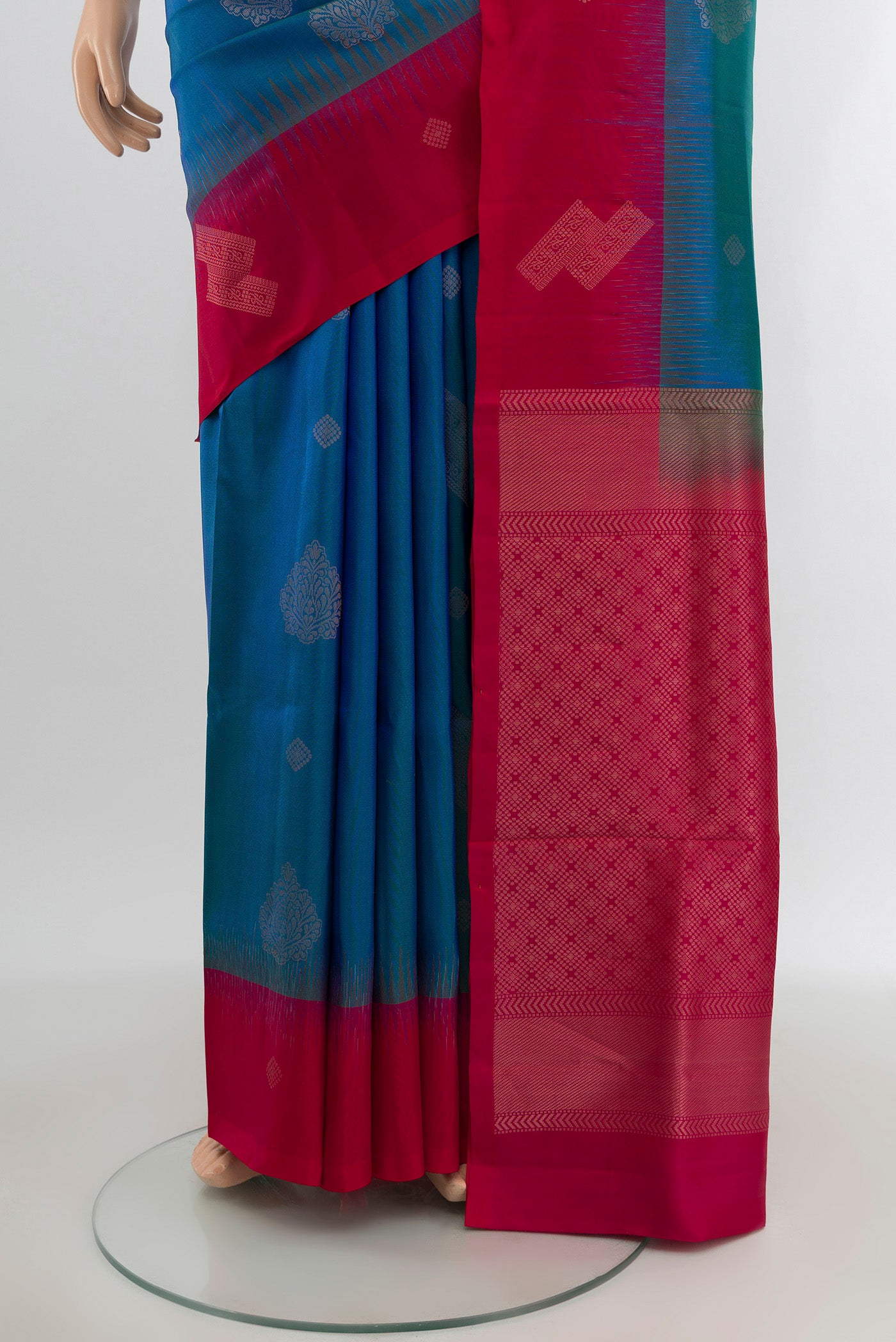 Pleats and pallu of Blue Soft Silk Saree with Zari Butta on the body and Zari Border. 