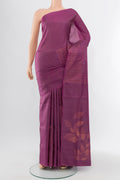 Bronze Soft Silk Saree with Zari Butta on the body and Silk Border.  displayed on a mannequin