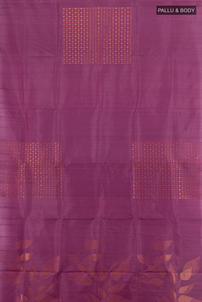 Flat view of Bronze Soft Silk Saree with Zari Butta on the body and Silk Border. 