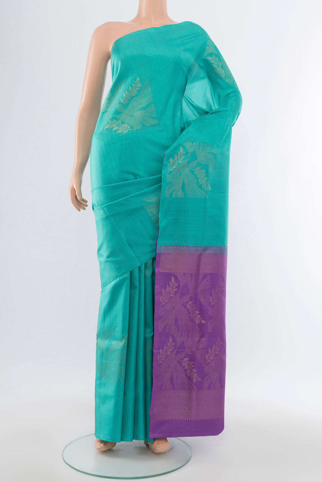 Pure Silk Pure Zari Light Blue Soft Saree with Zari Butta on the body and Silk Border.  displayed on a mannequin