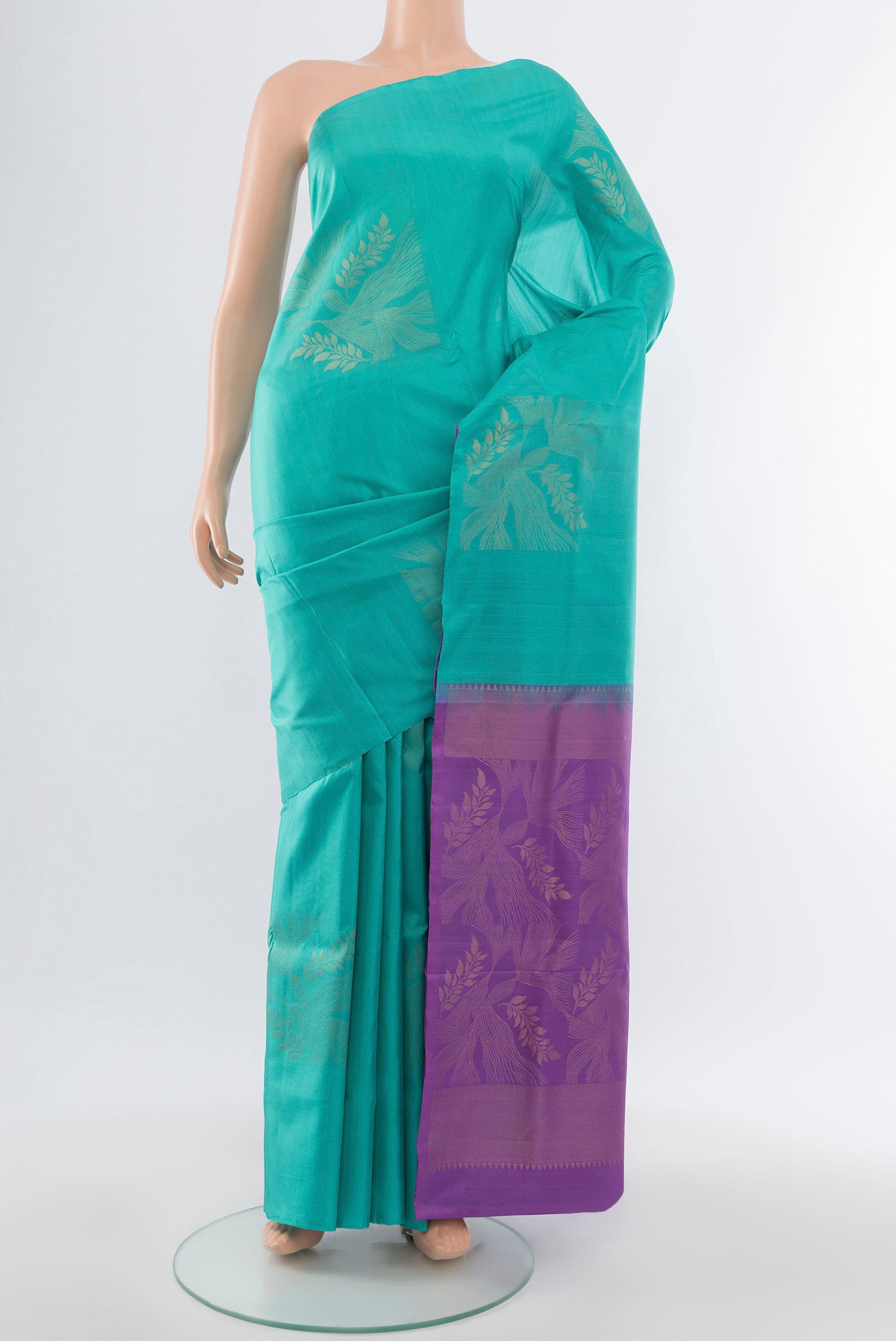 Pure Silk Pure Zari Light Blue Soft Saree with Zari Butta on the body and Silk Border.  displayed on a mannequin