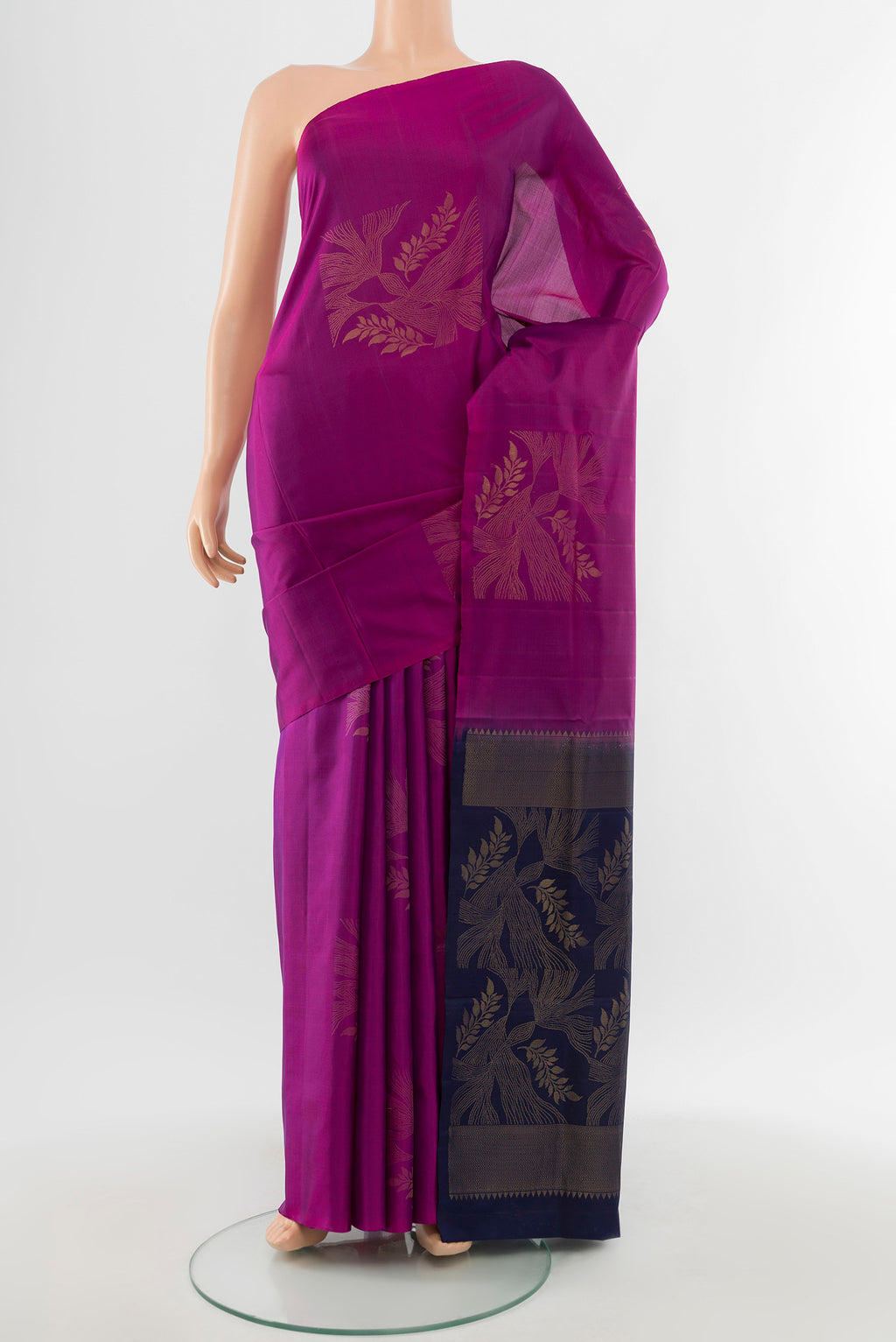 Pure Silk Pure Zari Purple Soft Saree with Zari Butta on the body and Silk Border.  displayed on a mannequin