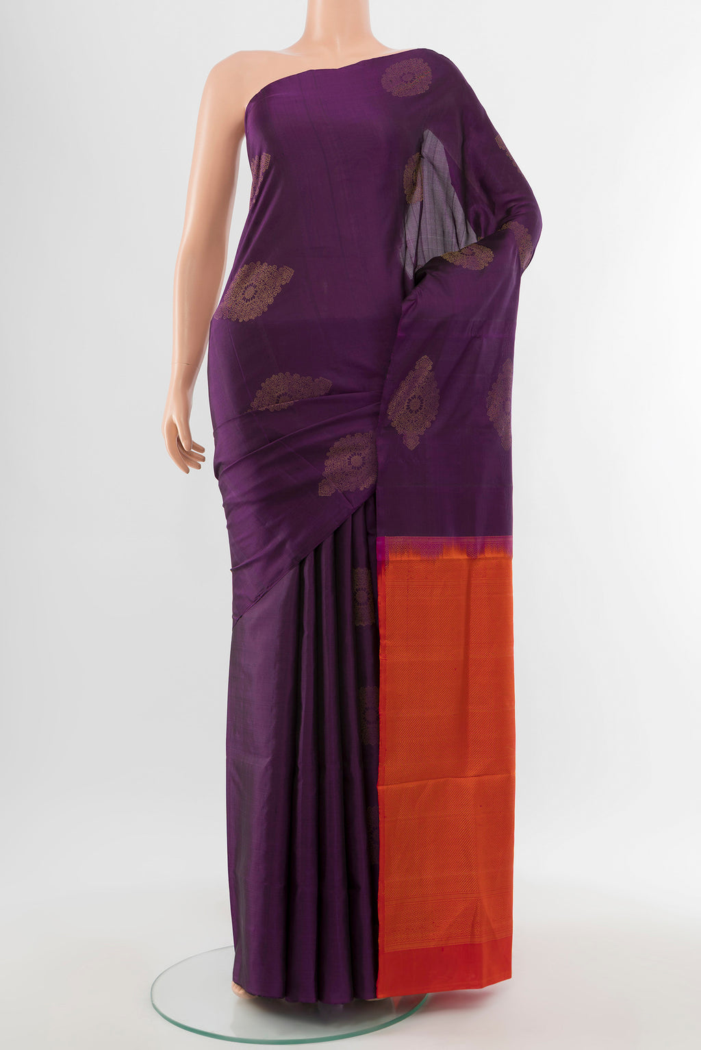 Violet Soft Silk Saree with Zari Butta on the body and Silk Border.  displayed on a mannequin