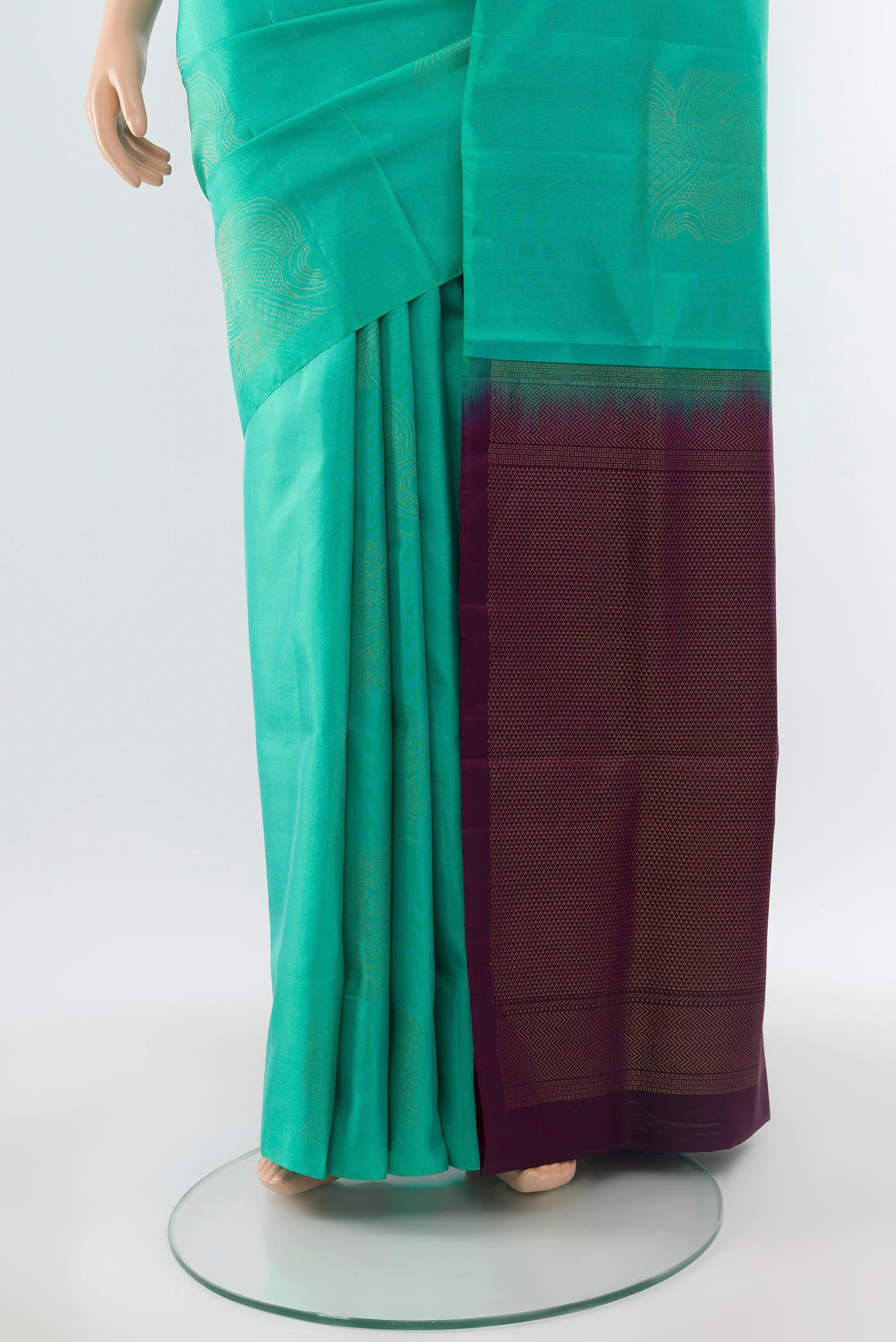 Pleats and pallu of Sky Blue Soft Silk Saree with Zari Butta on the body and Silk Border. 