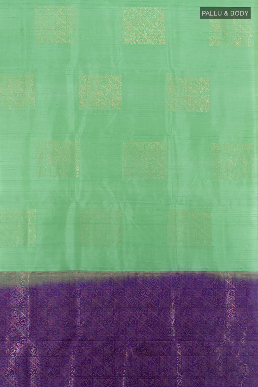 Flat view of Green Soft Silk Saree with Zari Butta on the body and Without Border. 
