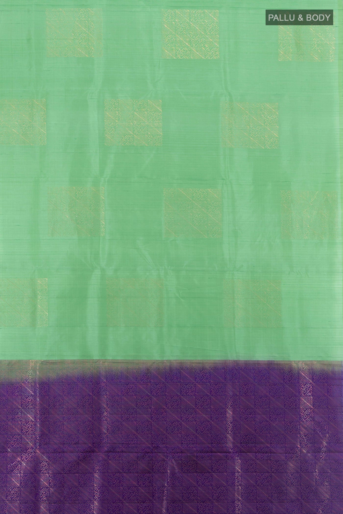 Flat view of Green Soft Silk Saree with Zari Butta on the body and Without Border. 