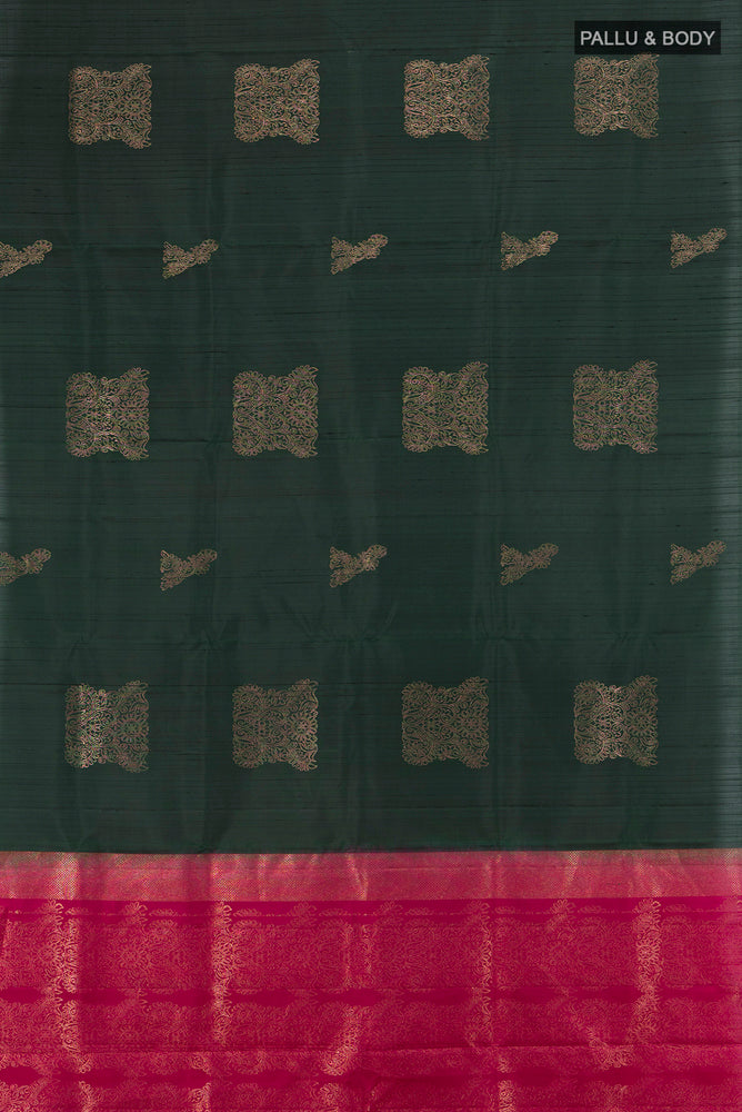 Flat view of Bottle Green Soft Silk Saree with Zari Butta on the body and Silk Border. 