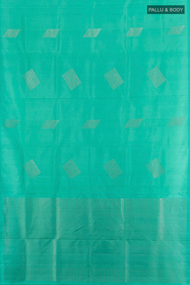 Flat view of Sky Blue Soft Silk Saree with Zari Butta on the body and Silk Border. 
