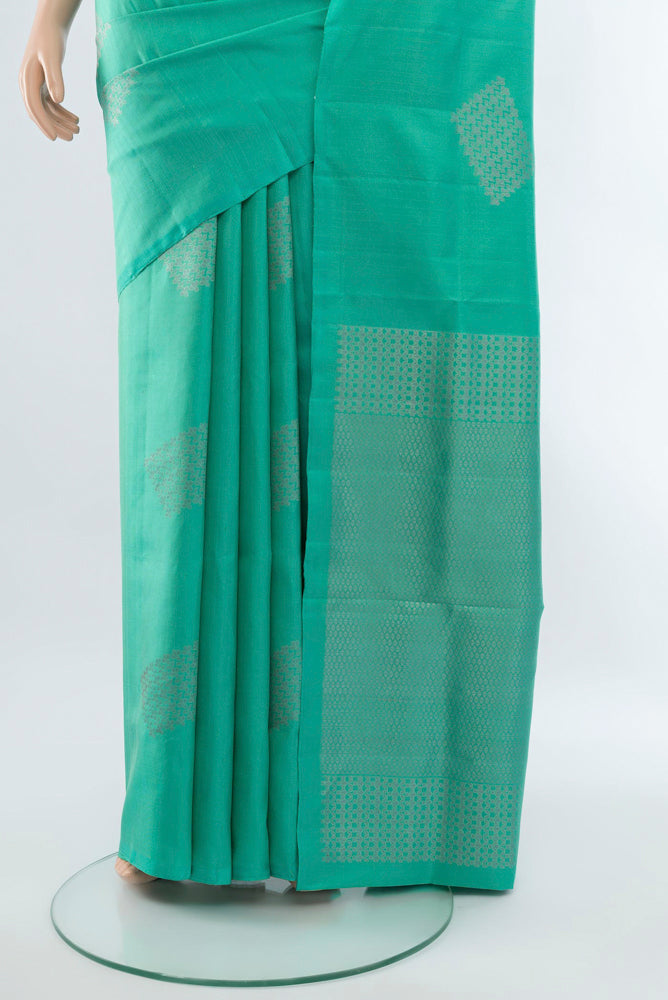 Pleats and pallu of Sky Blue Soft Silk Saree with Zari Butta on the body and Silk Border. 