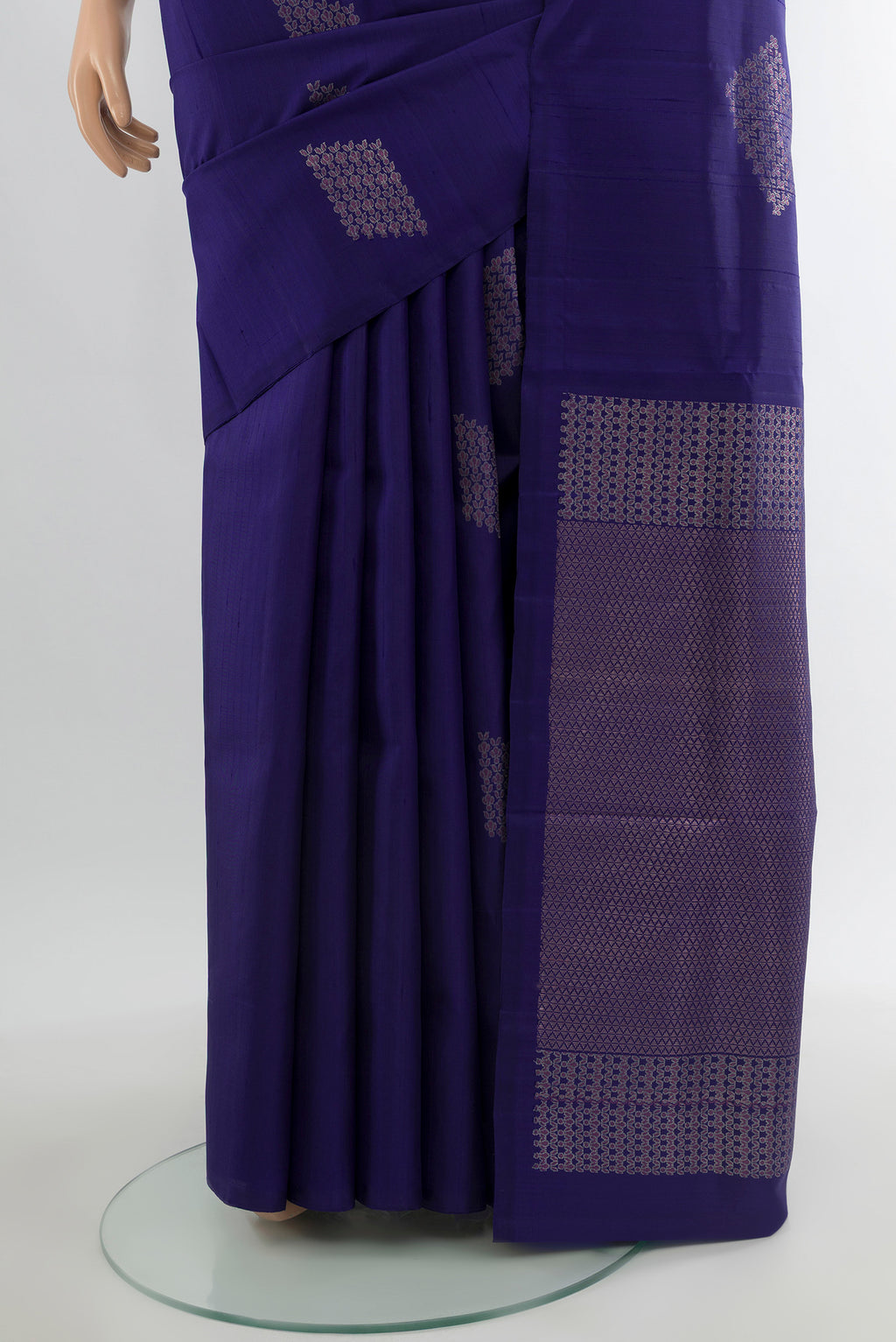 Pleats and pallu of Dark Blue Soft Silk Saree with Zari Butta on the body and Without Border. 