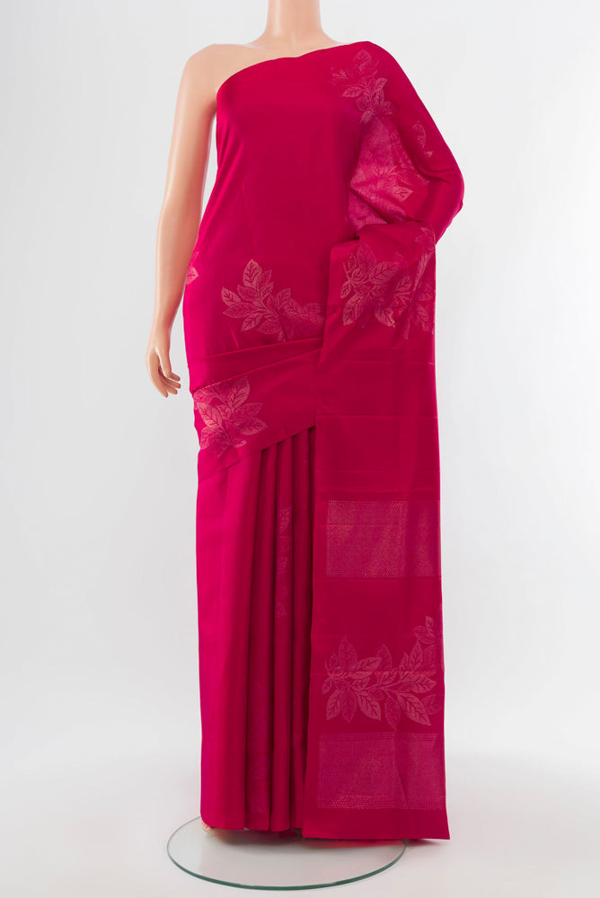 Dark Pink Soft Silk Saree with Zari Butta on the body and Silk Border.  displayed on a mannequin