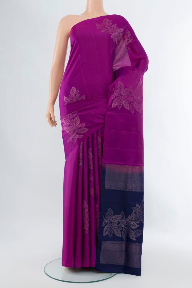 Purple Soft Silk Saree with Zari Butta on the body and Silk Border.  displayed on a mannequin