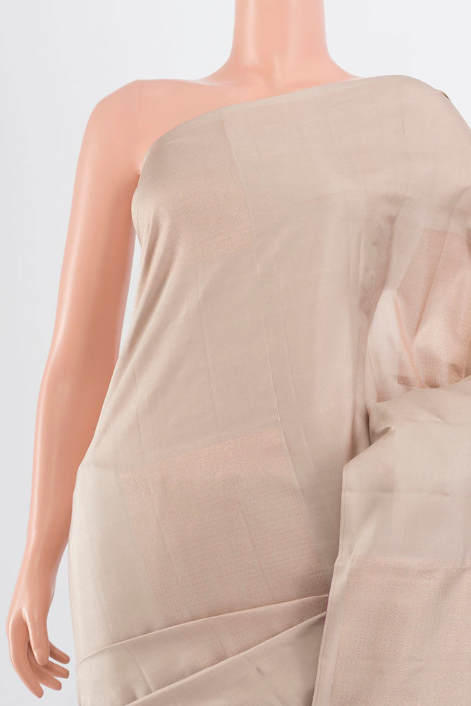 Border image of Beige Soft Silk Saree with Zari Butta on the body and Silk Border. 
