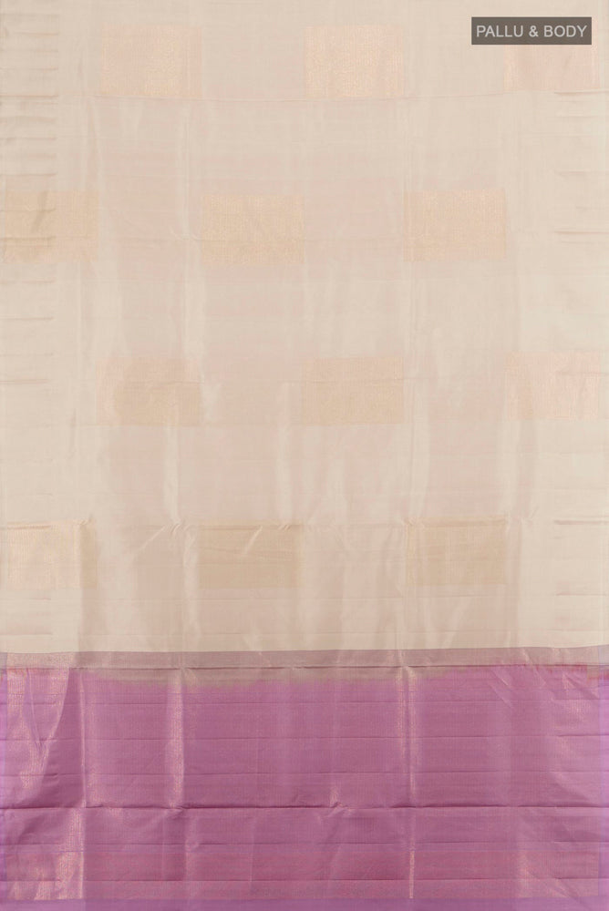 Flat view of Beige Soft Silk Saree with Zari Butta on the body and Silk Border. 