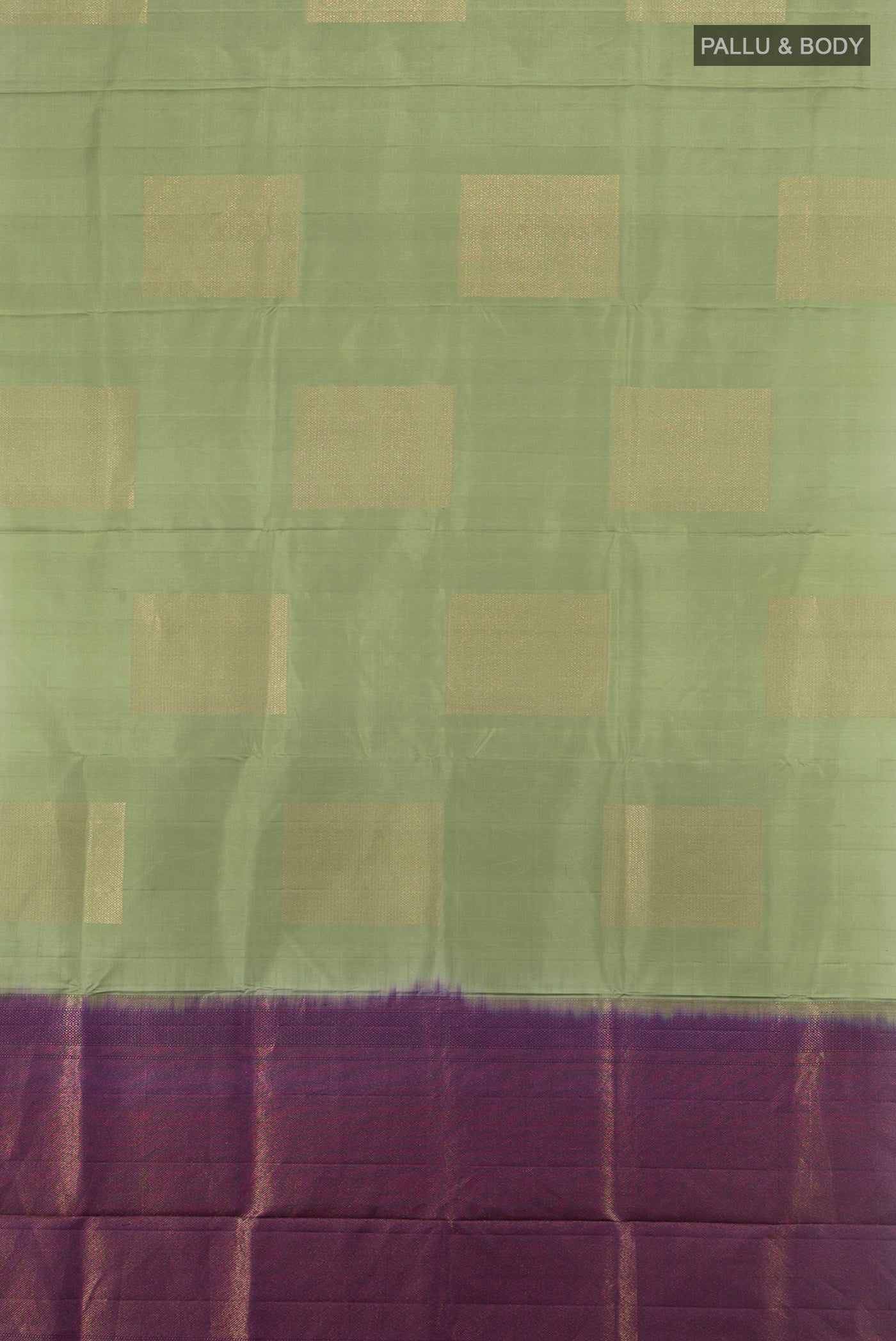 Flat view of Sage Green Soft Silk Saree with Zari Butta on the body and Without Border. 