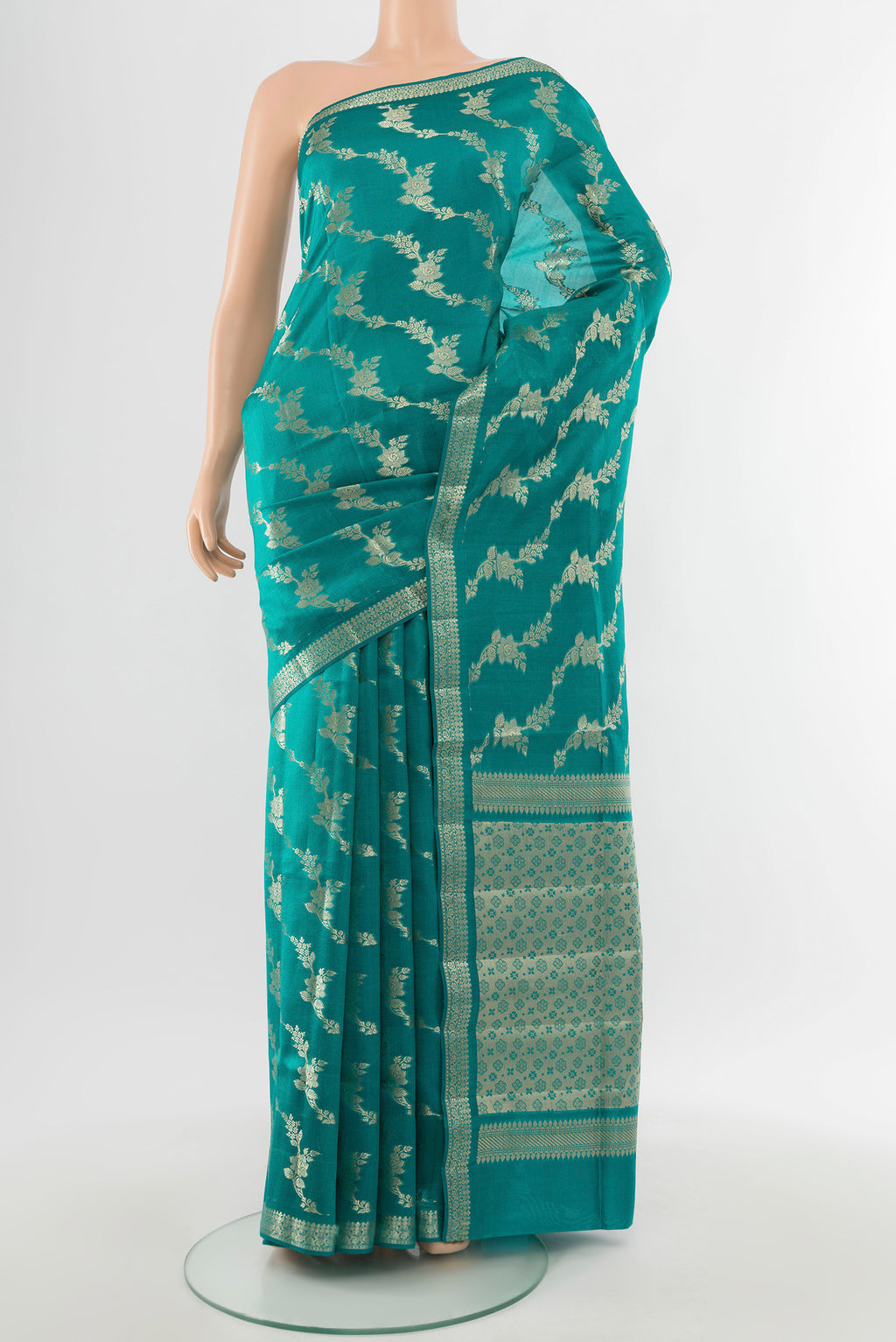Light Blue Banarasi Raw Silk Saree with Zari Butta on the body and Silk Border.  displayed on a mannequin