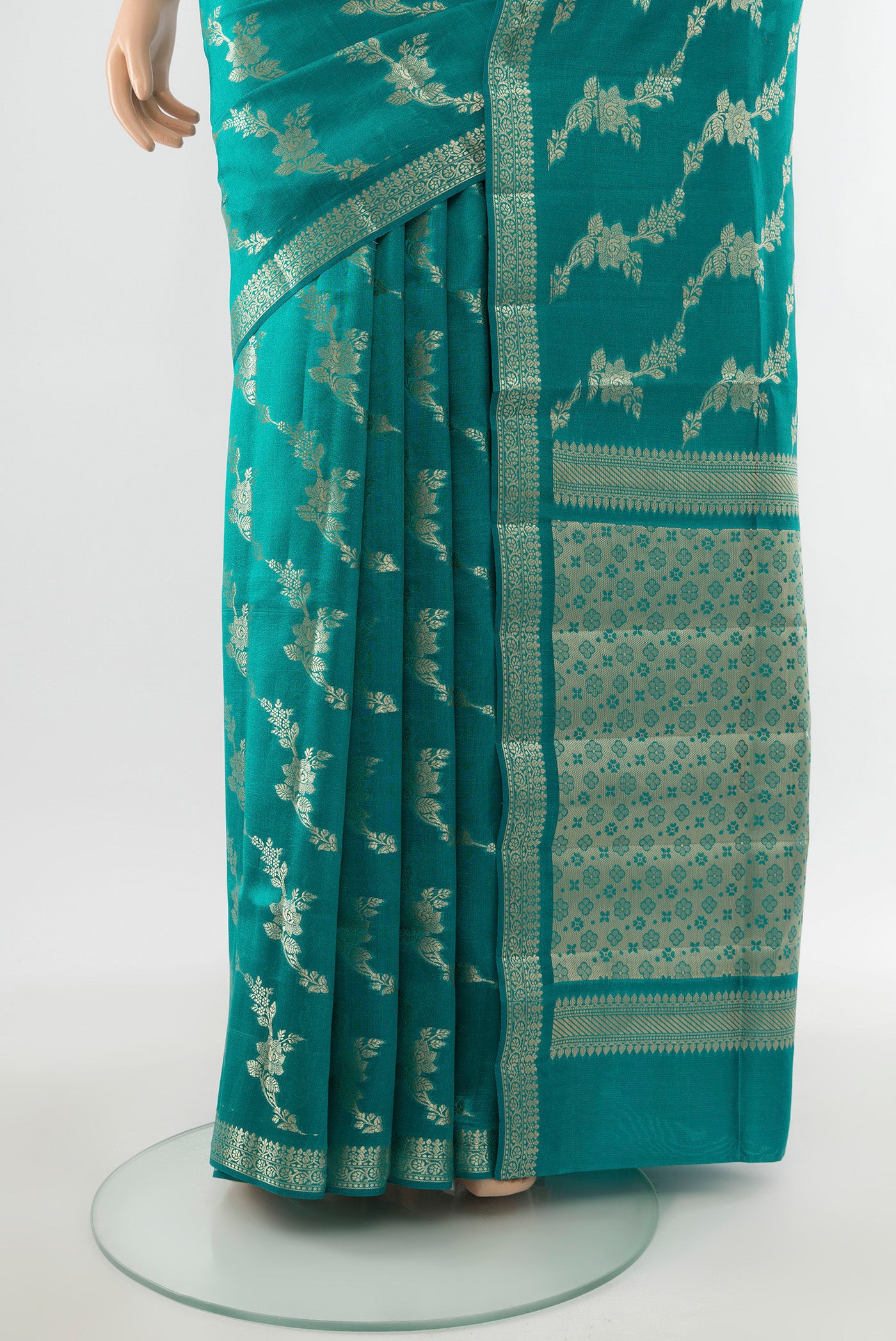 Pleats and pallu of Light Blue Banarasi Raw Silk Saree with Zari Butta on the body and Silk Border. 