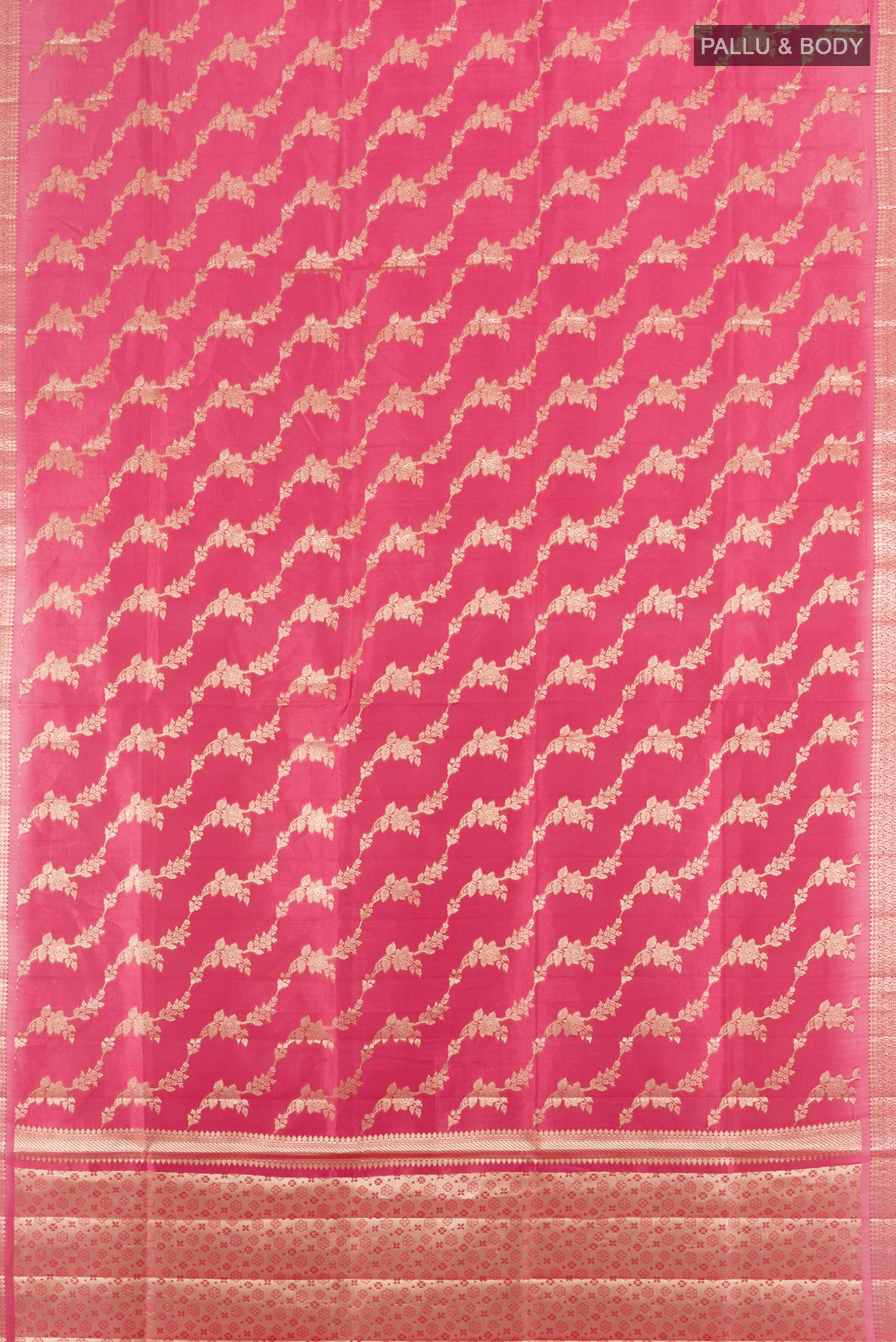 Flat view of Rose Gold Banarasi Raw Silk Saree with Zari Butta on the body and Silk Border. 