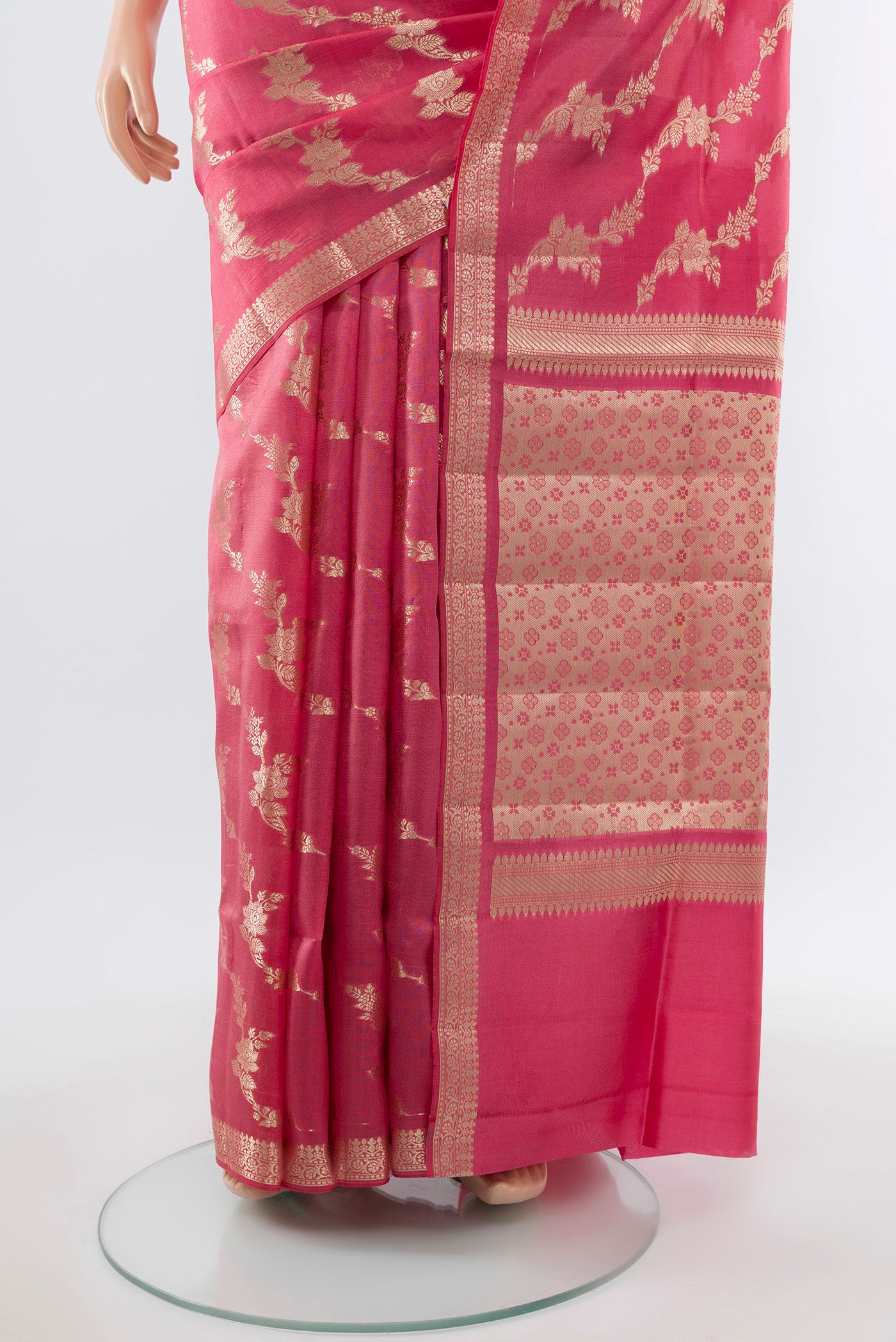 Pleats and pallu of Rose Gold Banarasi Raw Silk Saree with Zari Butta on the body and Silk Border. 