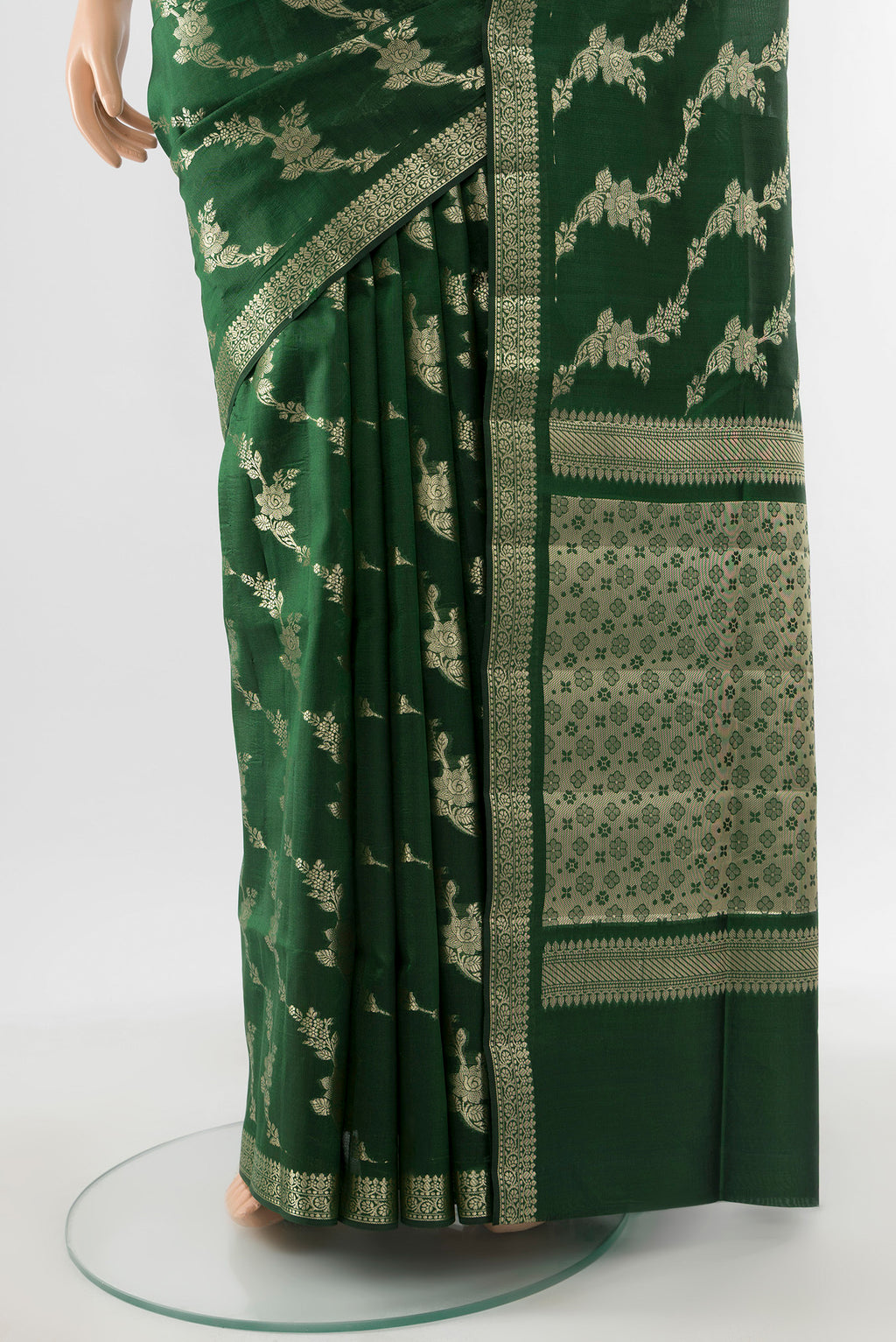 Pleats and pallu of Pure Silk Pure Zari Bottle Green Banarasi Raw Saree with Zari Butta on the body and Silk Border. 
