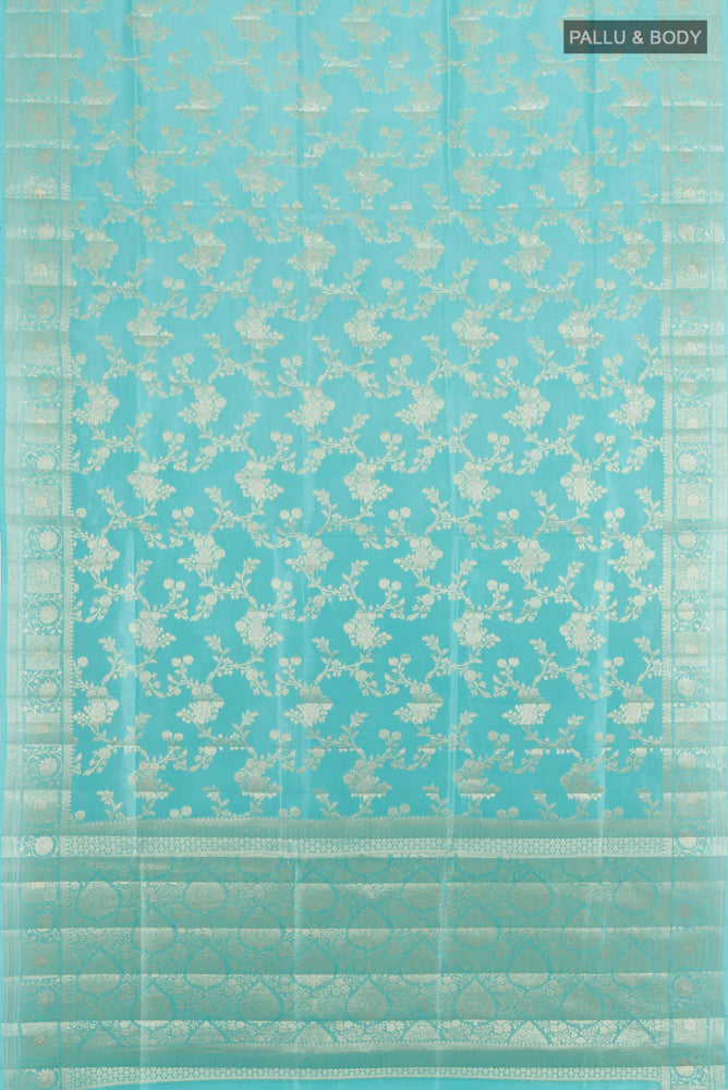Flat view of Sky Blue Banarasi Raw Silk Saree with Zari Butta on the body and Silk Border. 
