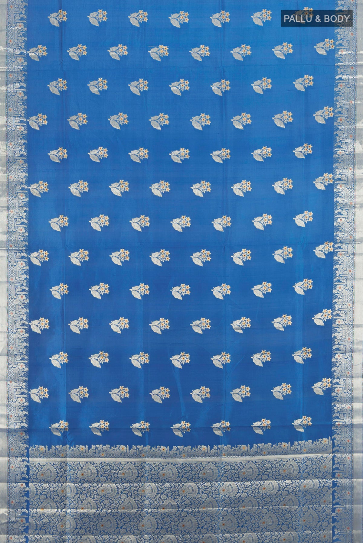 Flat view of Light Blue Banarasi Raw Silk Saree with Zari Butta on the body and Silk Border. 