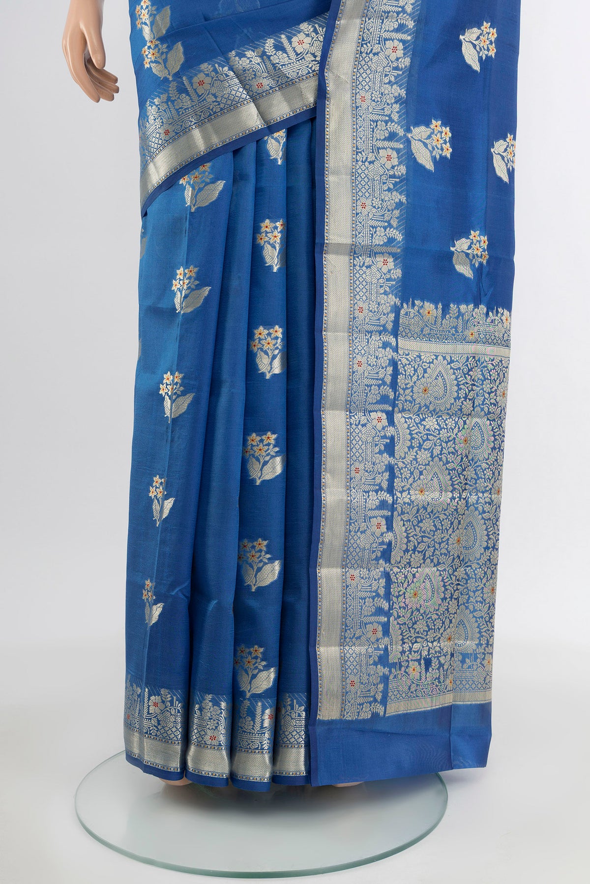 Pleats and pallu of Light Blue Banarasi Raw Silk Saree with Zari Butta on the body and Silk Border. 