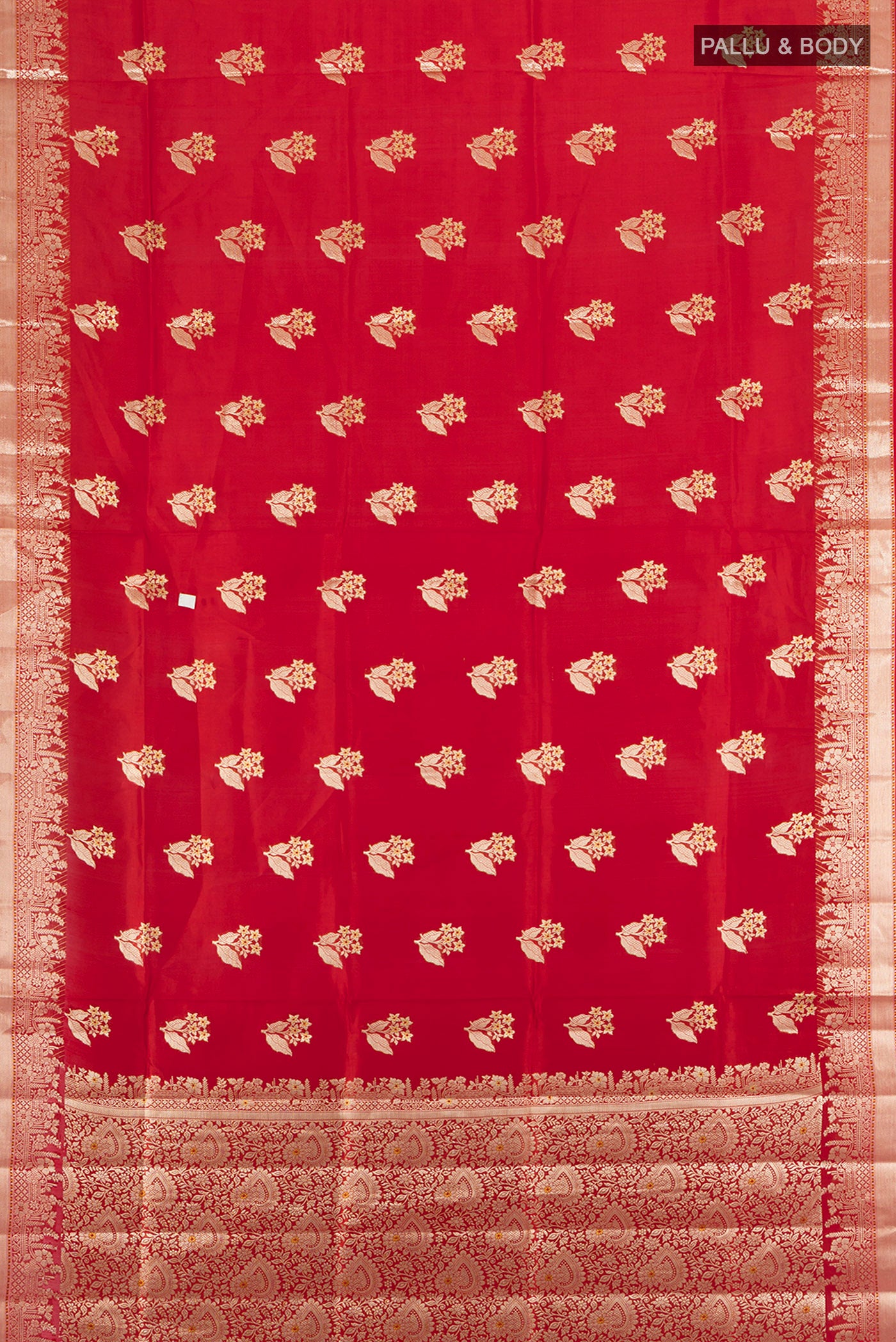 Flat view of Pure Silk Pure Zari Red Banarasi Raw Saree with Zari Butta on the body and Silk Border. 