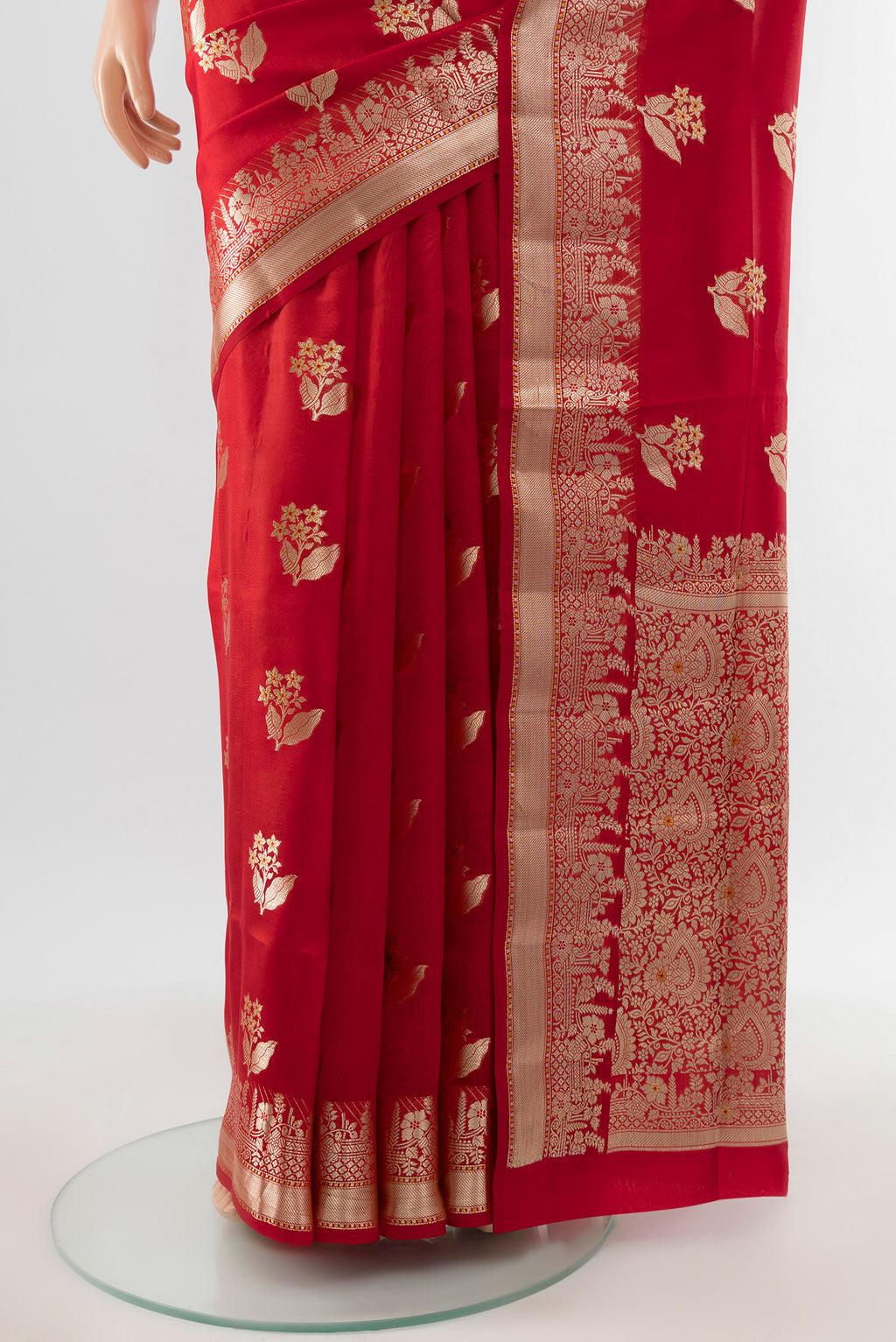 Pleats and pallu of Pure Silk Pure Zari Red Banarasi Raw Saree with Zari Butta on the body and Silk Border. 