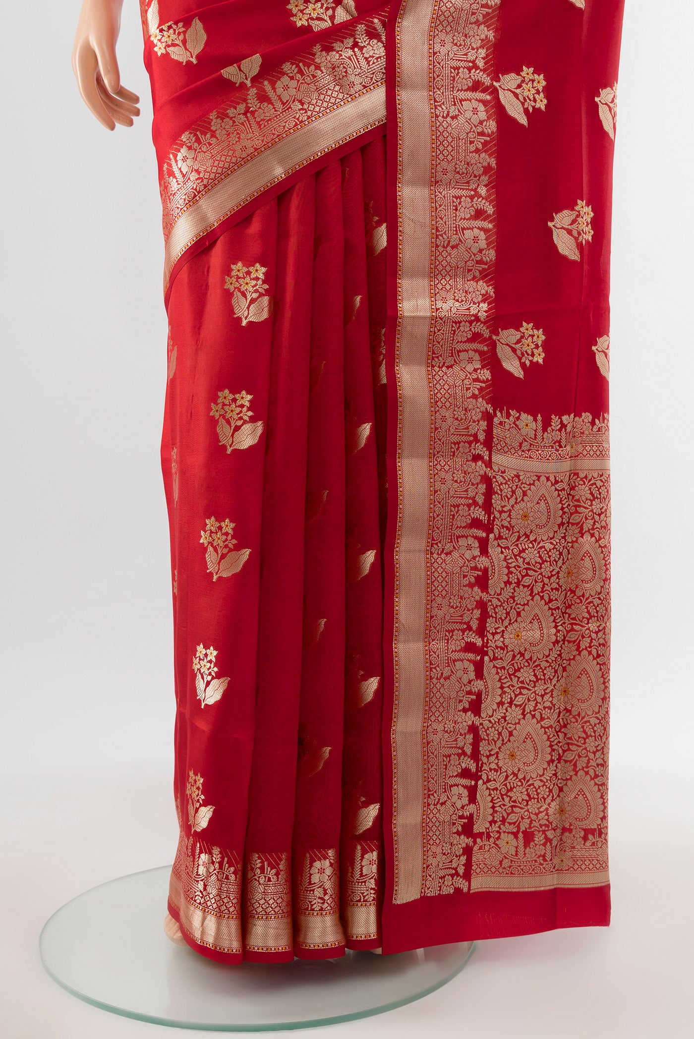 Pleats and pallu of Pure Silk Pure Zari Red Banarasi Raw Saree with Zari Butta on the body and Silk Border. 