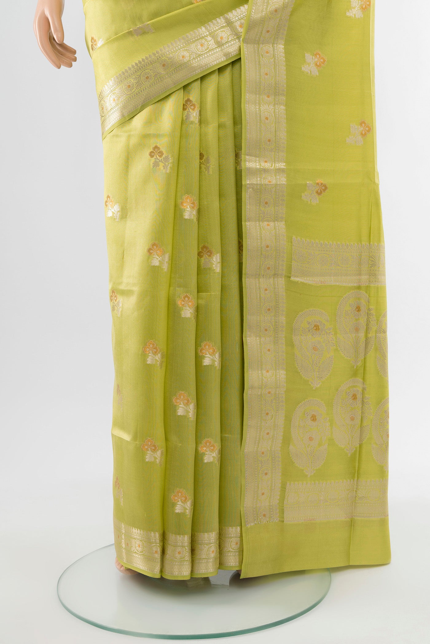 Pleats and pallu of Pista Green Banarasi Raw Silk Saree with Zari Butta on the body and Silk Border. 