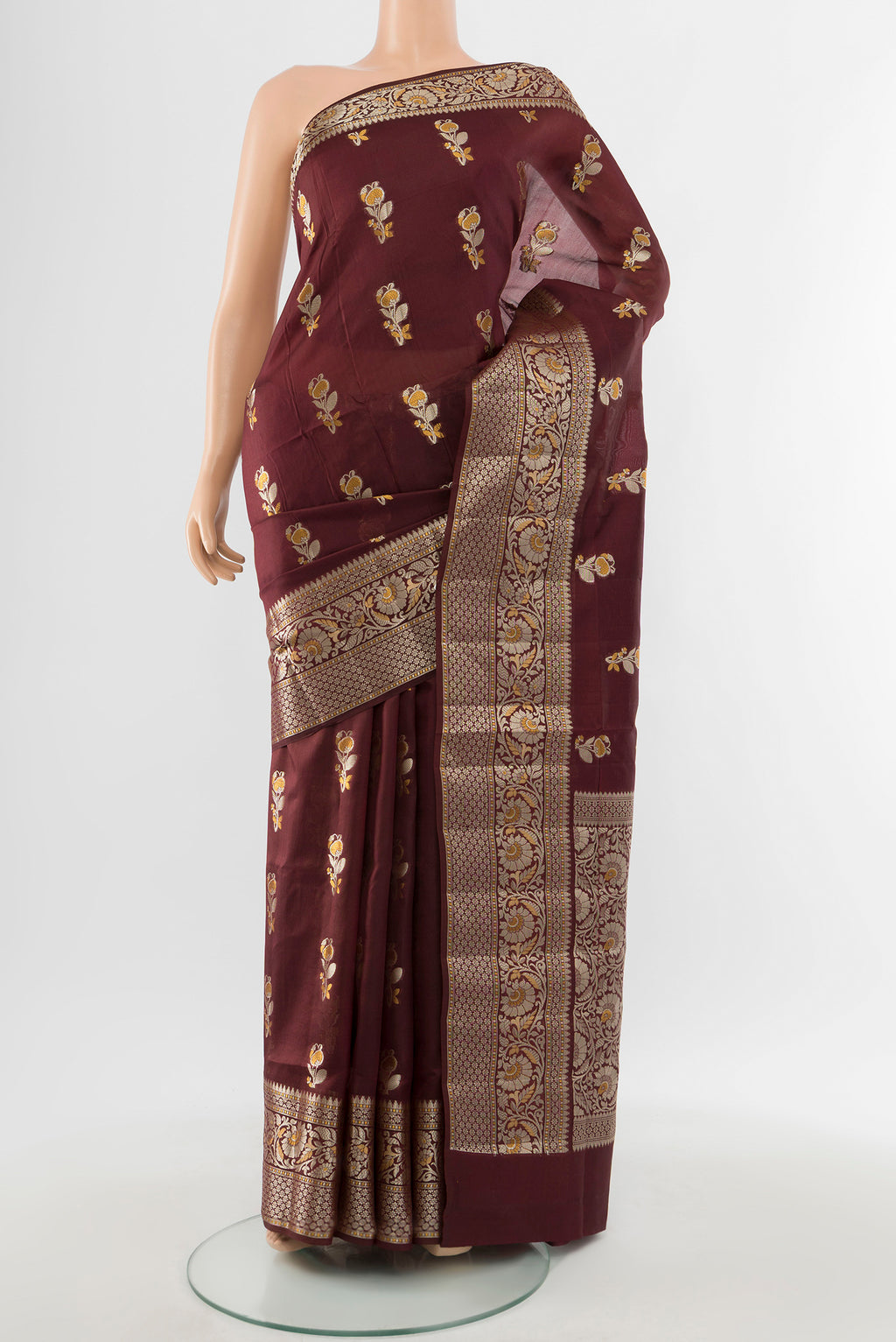 Coffee Brown Banarasi Raw Silk Saree with Zari Butta on the body and Silk Border.  displayed on a mannequin