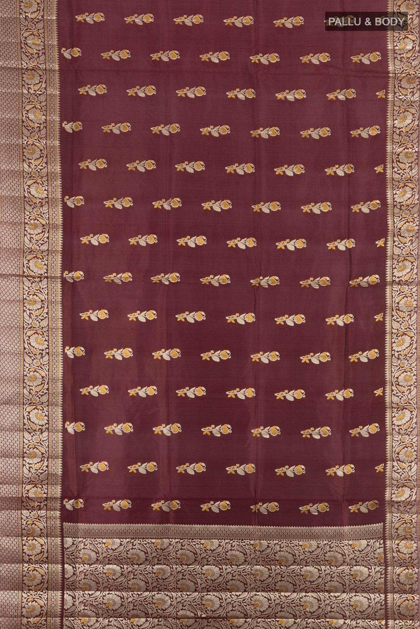 Flat view of Coffee Brown Banarasi Raw Silk Saree with Zari Butta on the body and Silk Border. 