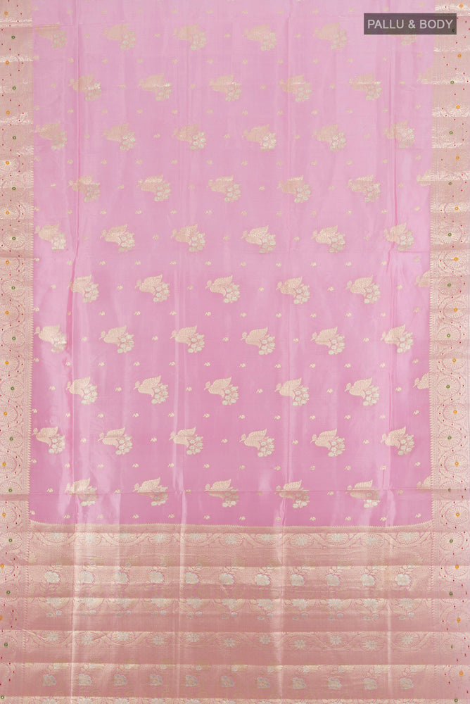 Flat view of Rose Gold Banarasi Raw Silk Saree with Zari Butta on the body and Silk Border. 
