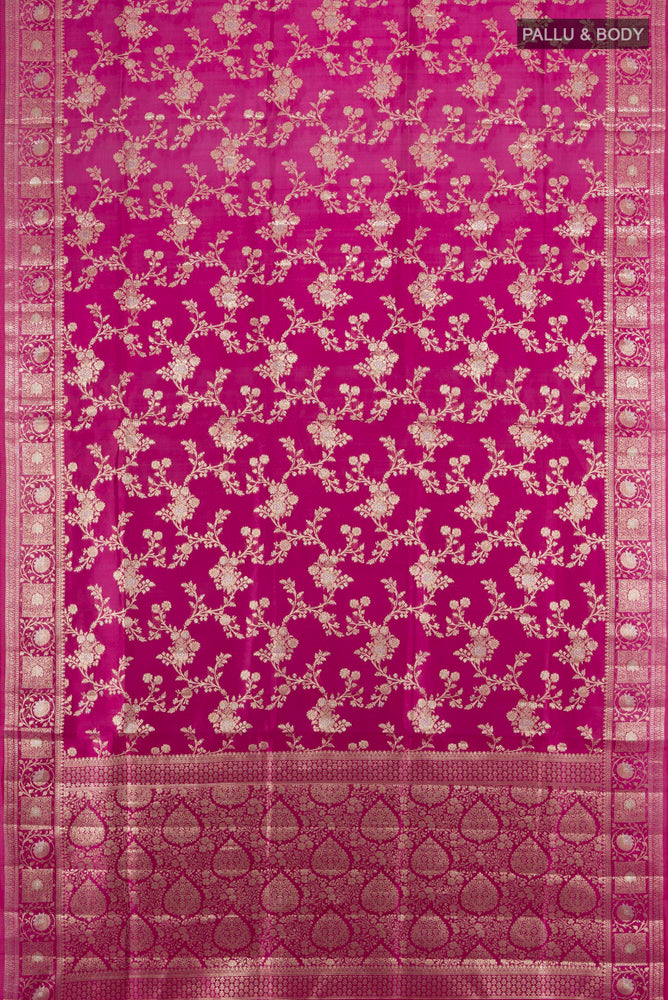 Flat view of Magenta Banarasi Raw Silk Saree with Zari Butta on the body and Silk Border. 