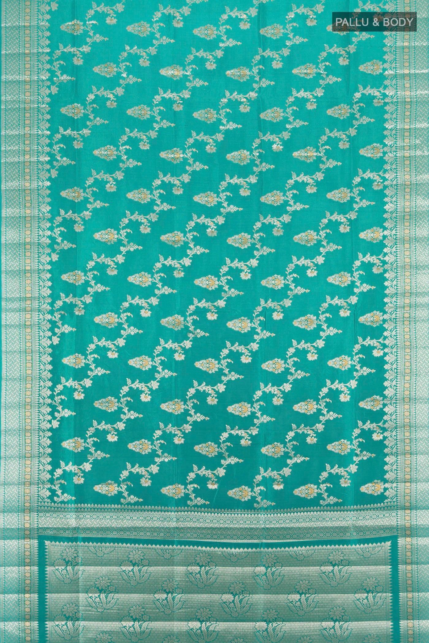 Flat view of Light Blue Banarasi Raw Silk Saree with Zari Butta on the body and Silk Border. 