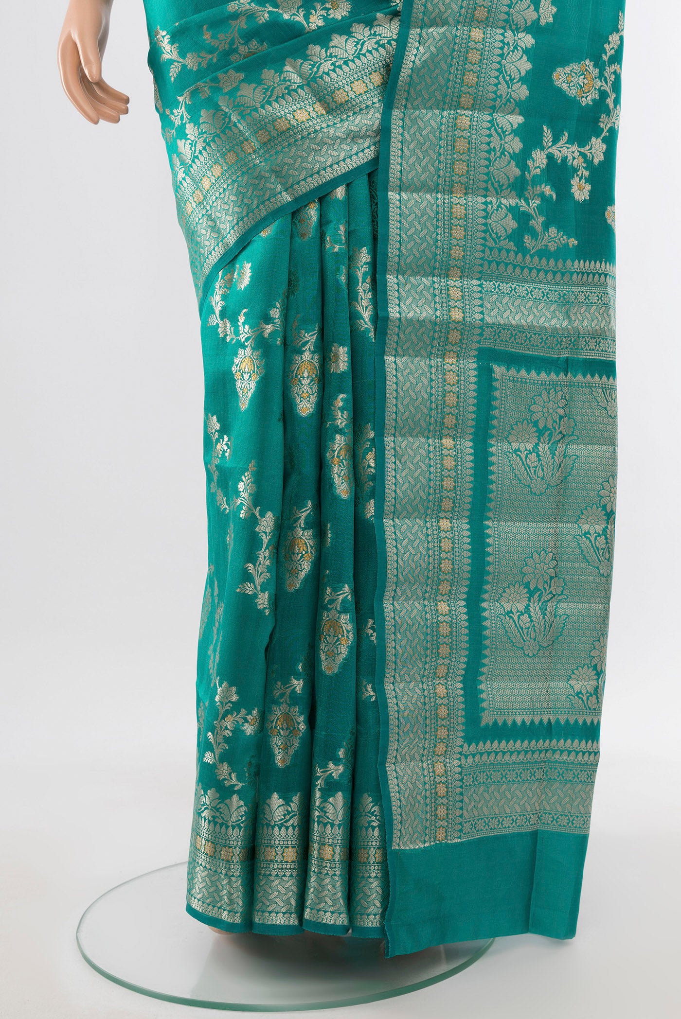Pleats and pallu of Light Blue Banarasi Raw Silk Saree with Zari Butta on the body and Silk Border. 