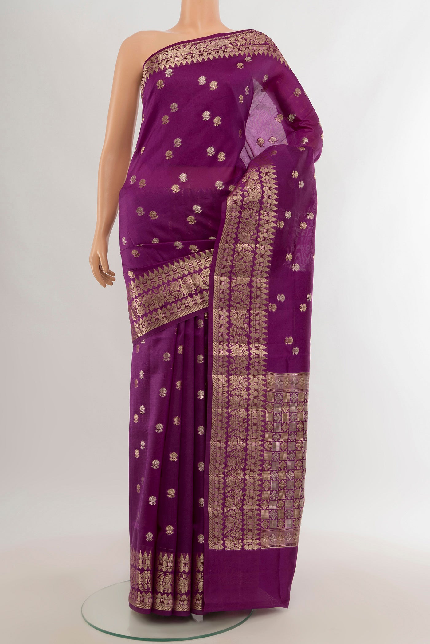 Violet Banarasi Raw Silk Saree with Zari Butta on the body and Zari Border.  displayed on a mannequin