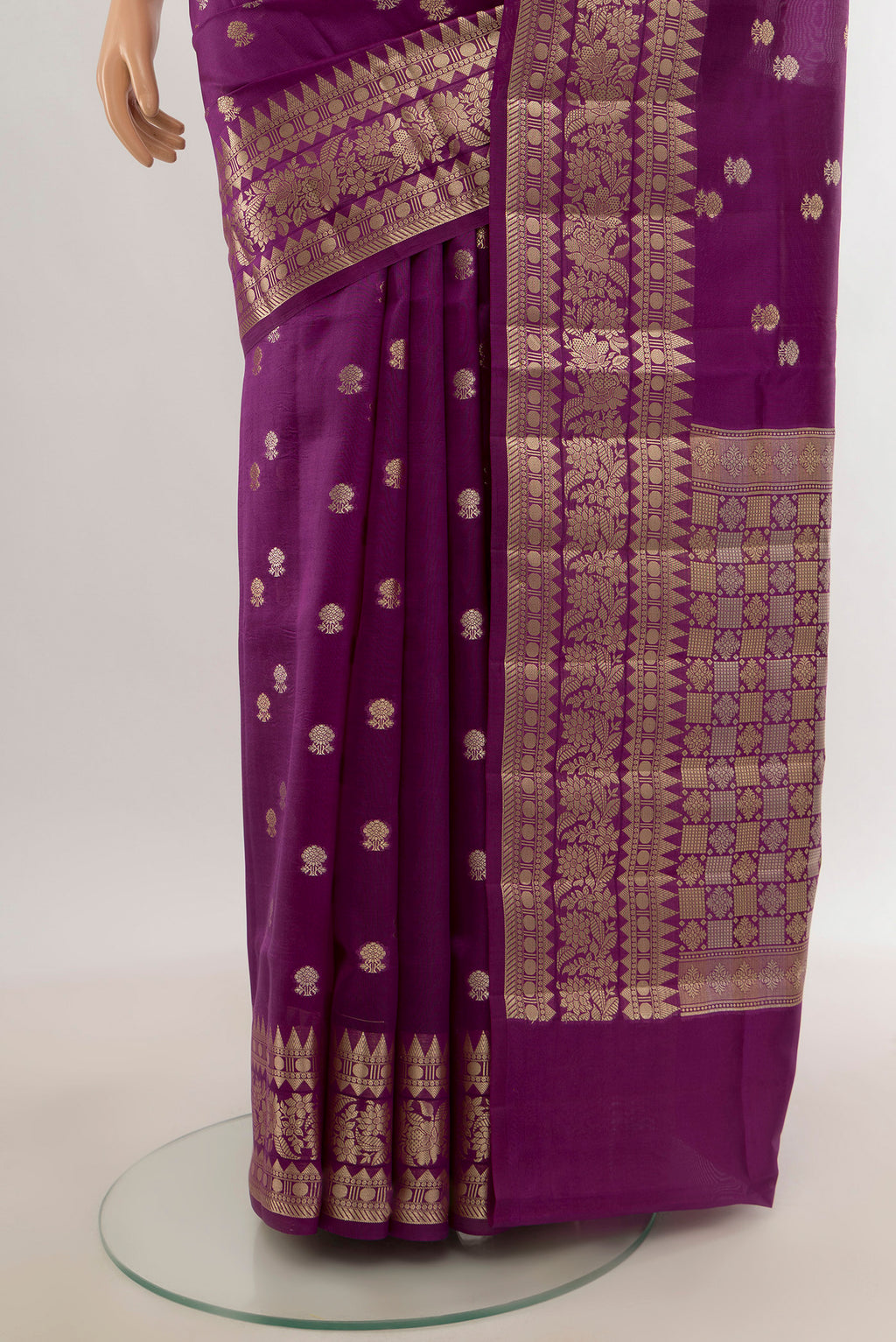 Pleats and pallu of Violet Banarasi Raw Silk Saree with Zari Butta on the body and Zari Border. 
