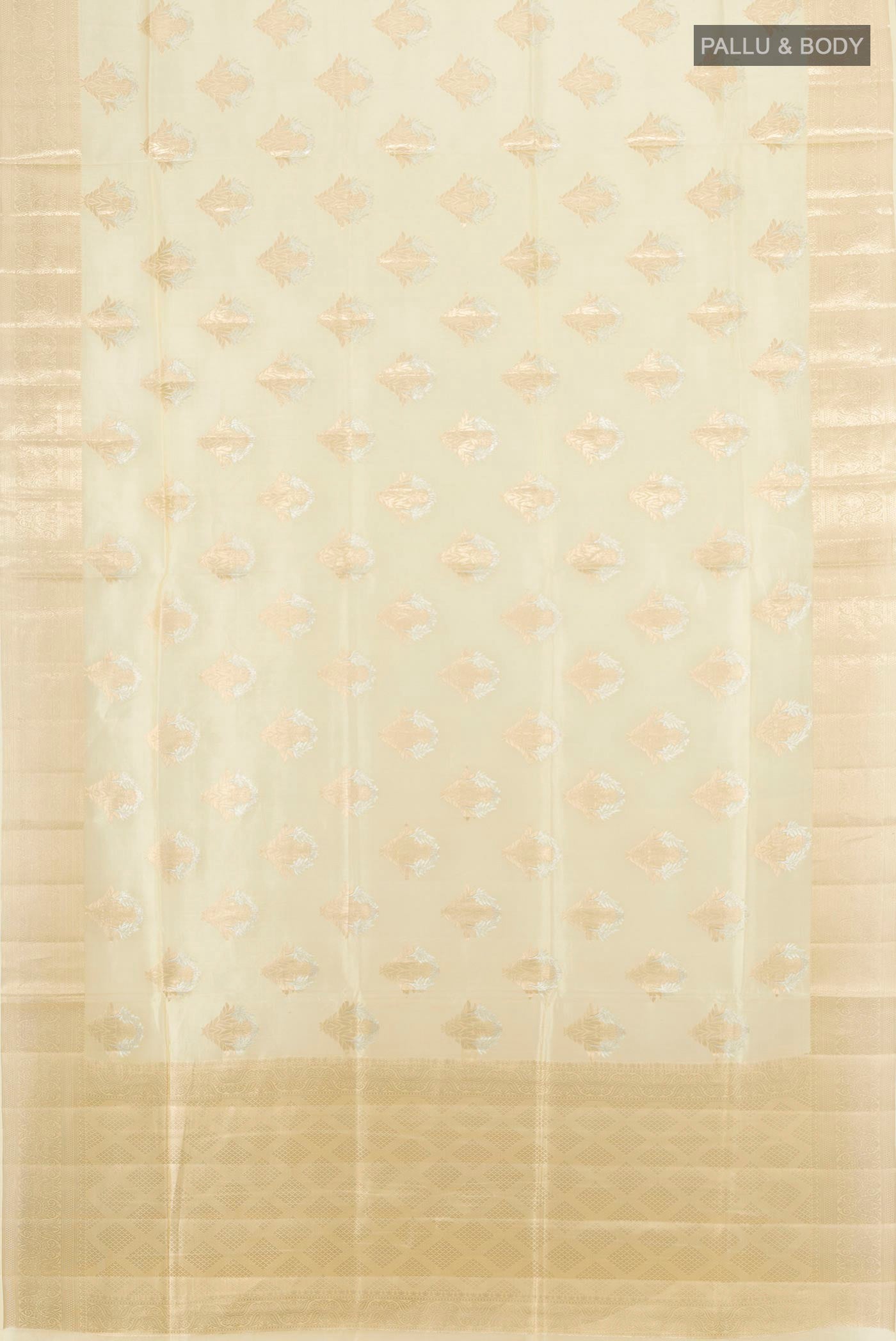 Flat view of Cream Banarasi Raw Silk Saree with Zari Butta on the body and Zari Border. 
