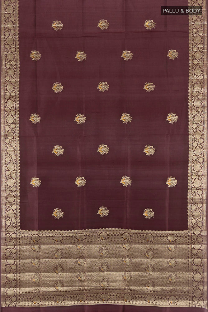 Flat view of Coffee Brown Banarasi Raw Silk Saree with Zari Butta on the body and Silk Border. 