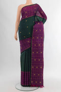 Pure Silk Pure Zari Bottle Green Kanjivaram Saree with Zari Butta on the body and Zari Border.  displayed on a mannequin