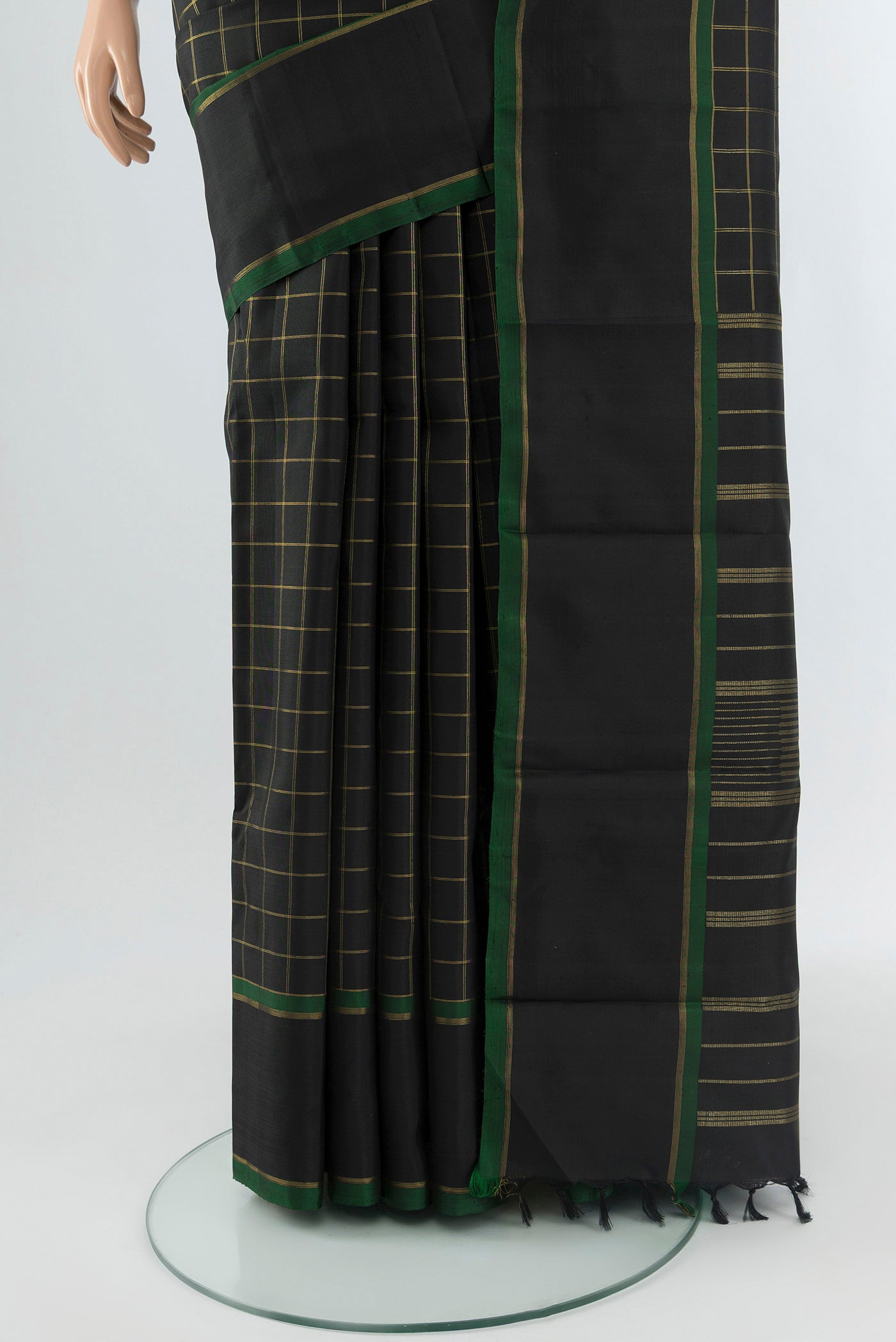 Pleats and pallu of Pure Silk Pure Zari Black Kanchipuram Saree with Checked design on the body and Plain Border. 