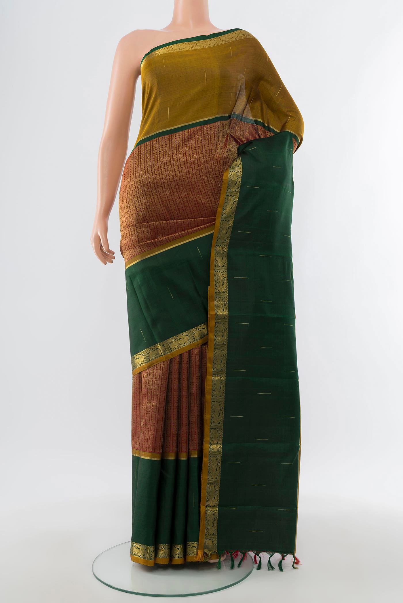 Pure Silk Pure Zari Maroon Kanjivaram Saree with Zari Brocade on the body and Zari Border.  displayed on a mannequin