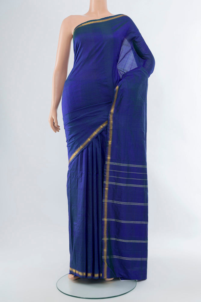 Dark Blue Kanchipuram Silk Saree with Plain Body and Silk Border.  displayed on a mannequin