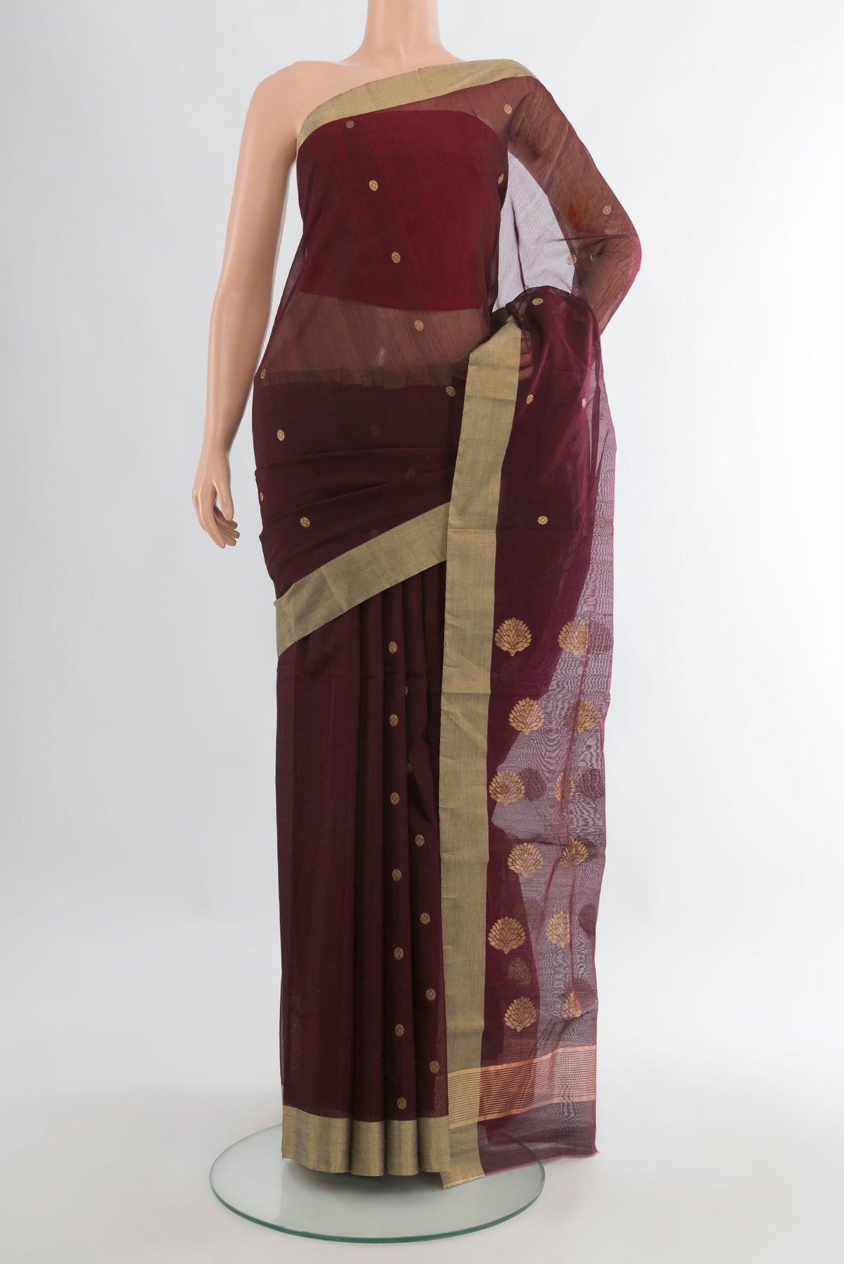 Coffee Brown Chanderi Cotton Saree with Zari Butta on the body and Zari Border.  displayed on a mannequin