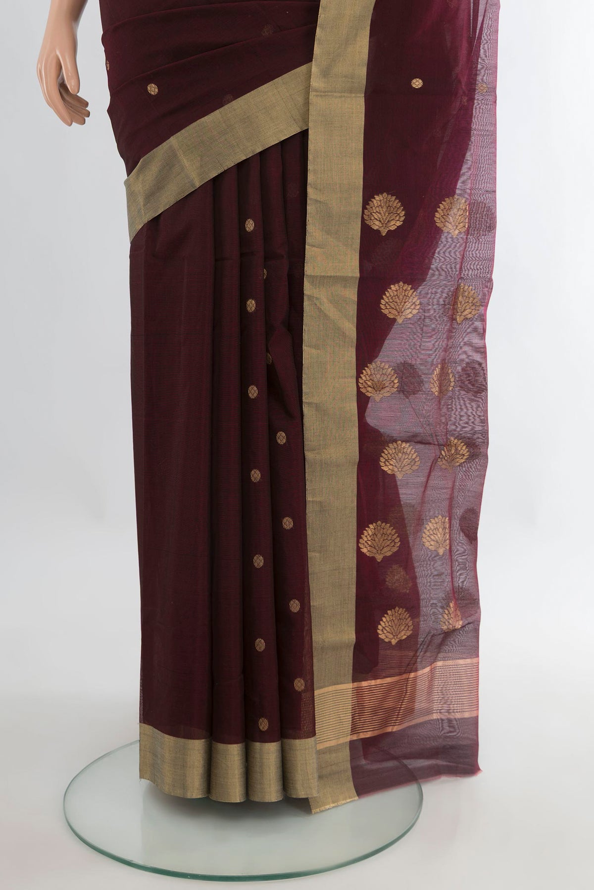 Pleats and pallu of Coffee Brown Chanderi Cotton Saree with Zari Butta on the body and Zari Border. 